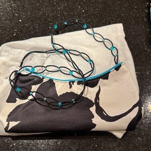 PRICE DROP40.❤️Black and Cream Silky Floral Bag with Beaded Strap